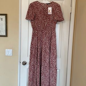 Maxi dress with short flutter sleeves.